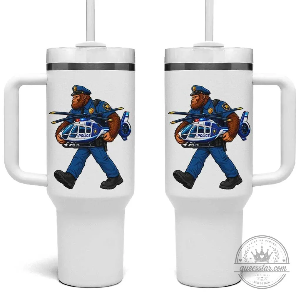 Funny Bigfoot Police Officer Carrying Helicopter Tumbler With Handle 1 Funny Bigfoot Police Officer Carrying Helicopter Tumbler With Handle